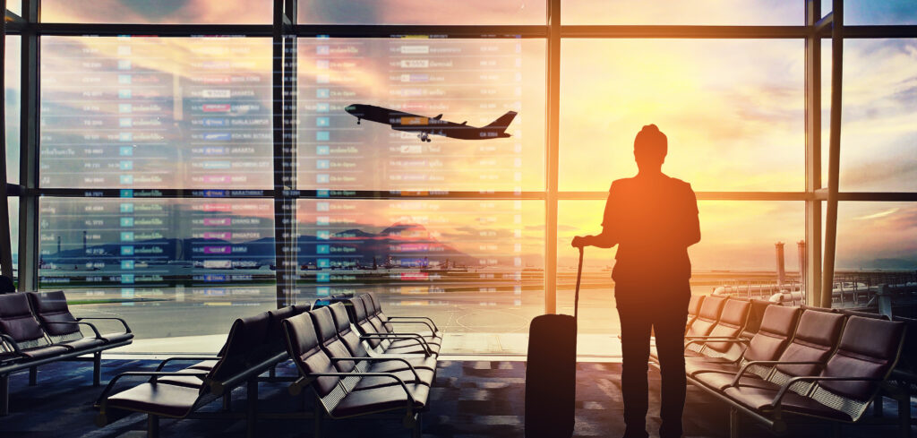 Silhouettes passenger airport. Airline travel concept. AdobeStock 274863011 1024x489